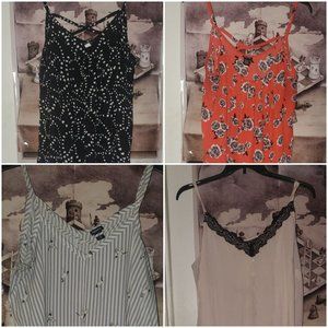 4 tops. all torrid. 3 are size 2 and 1 is size 3. All spaghetti strap
